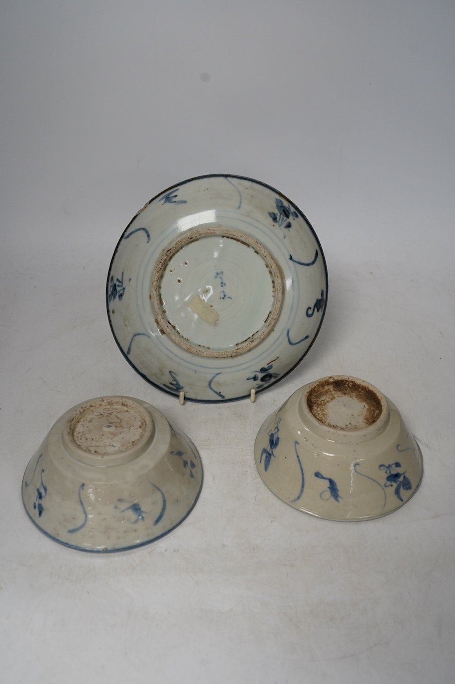 Three pieces of Chinese Teksing cargo comprising two bowls and a dish, largest 18.5cm. Condition - fair, hairline crack to dish